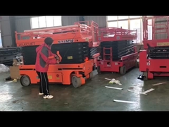 المحرك الكهربائي 12 متر رفع مقص ذاتية الدفع مع 2.27m X 1.12m حجم المنصة